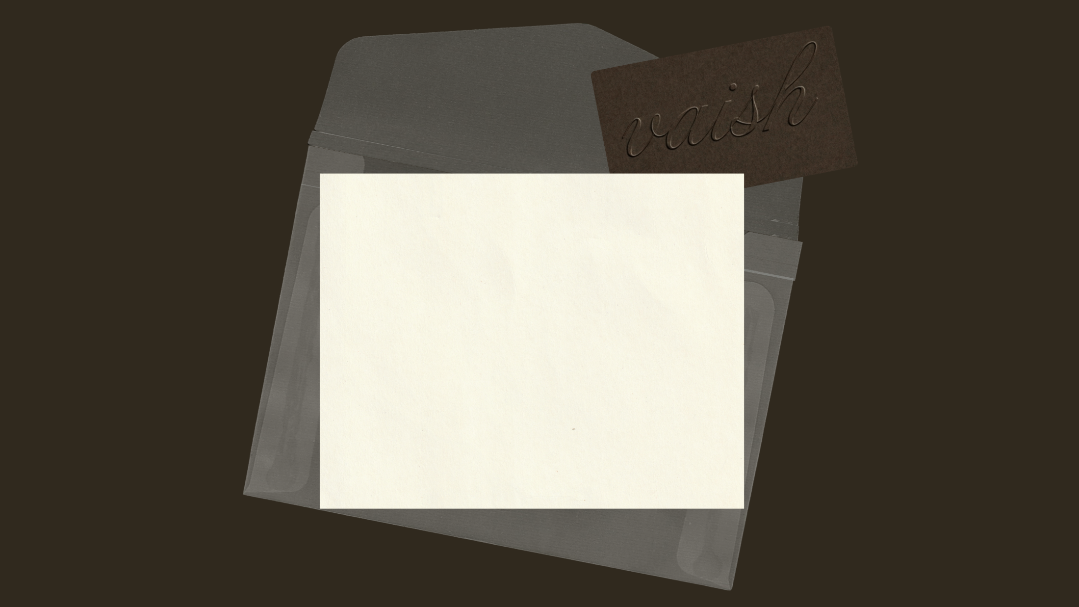 A vellum envelope holding the vaish card
